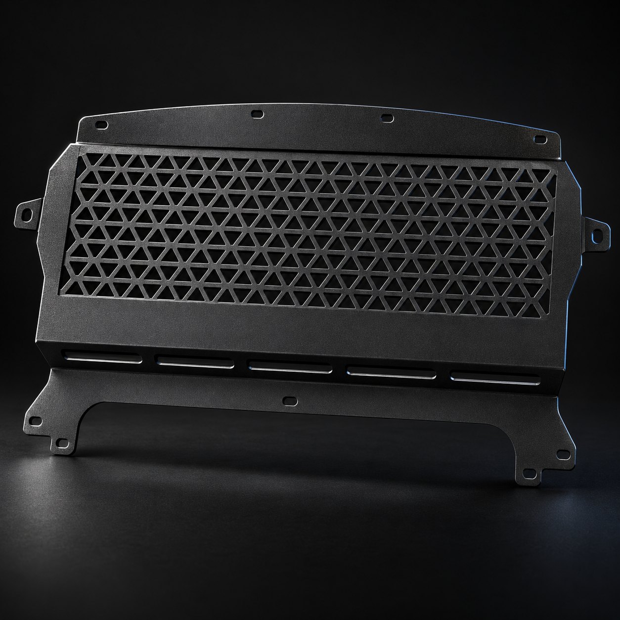 Black S55 oil cooler guard with a triangular lattice mesh screen and slotted lower mounting bracket